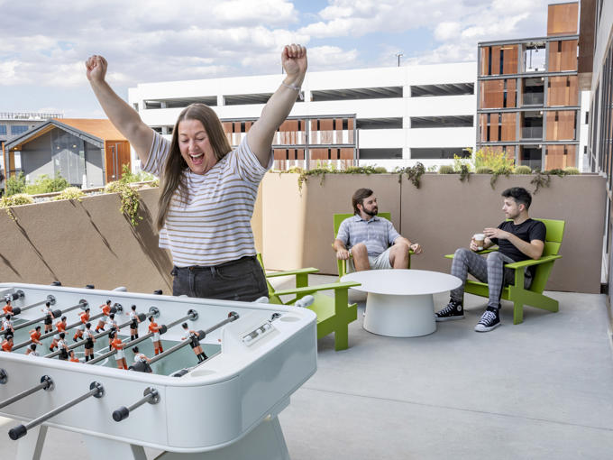 a group of people sitting around a table