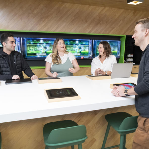 a group of people sitting at a table