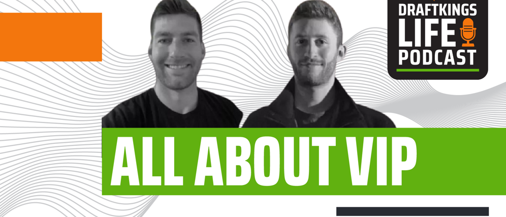 a couple of men smiling