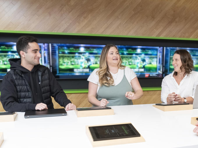 a group of people sitting at a table