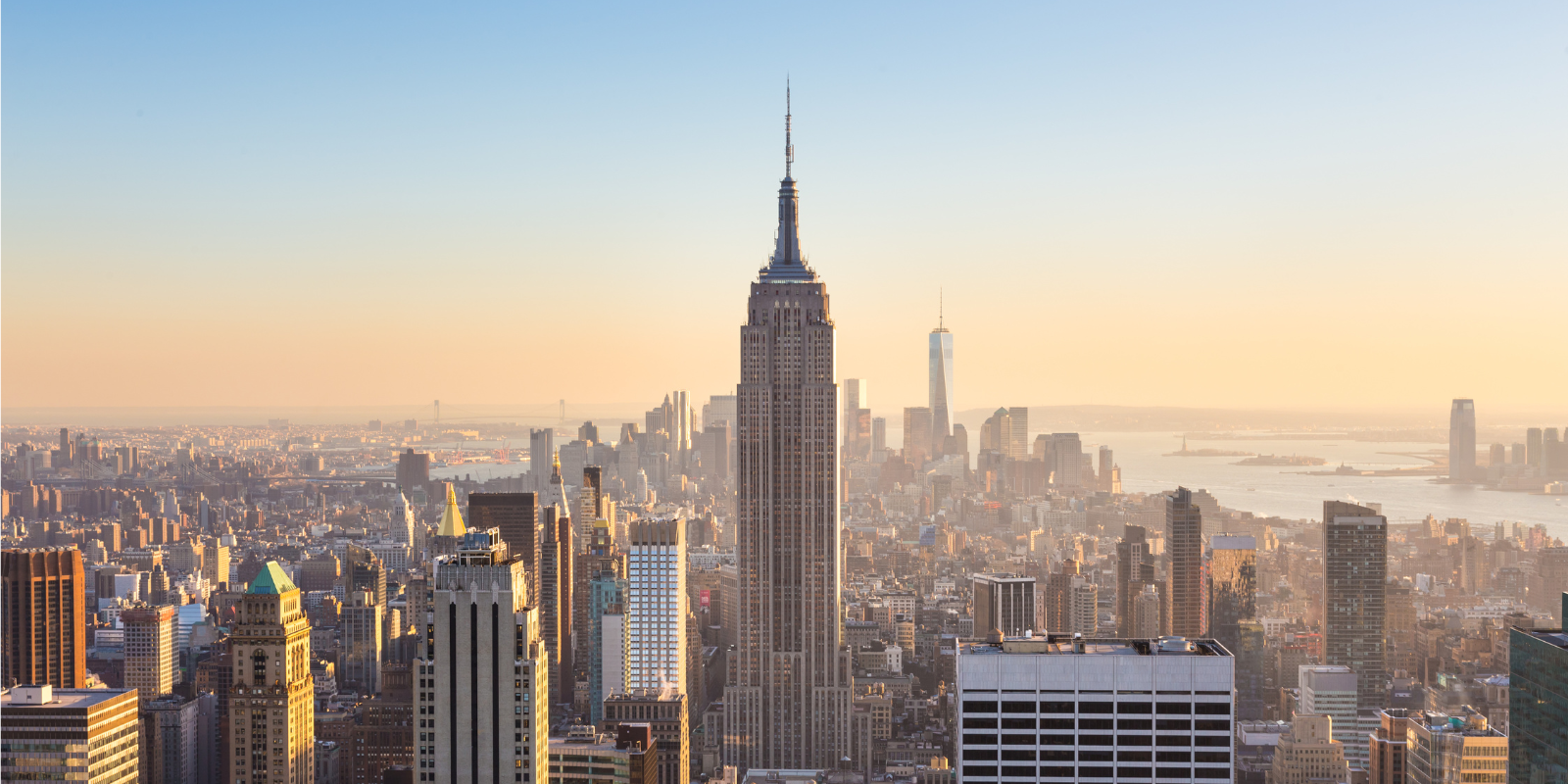 a city skyline with tall buildings