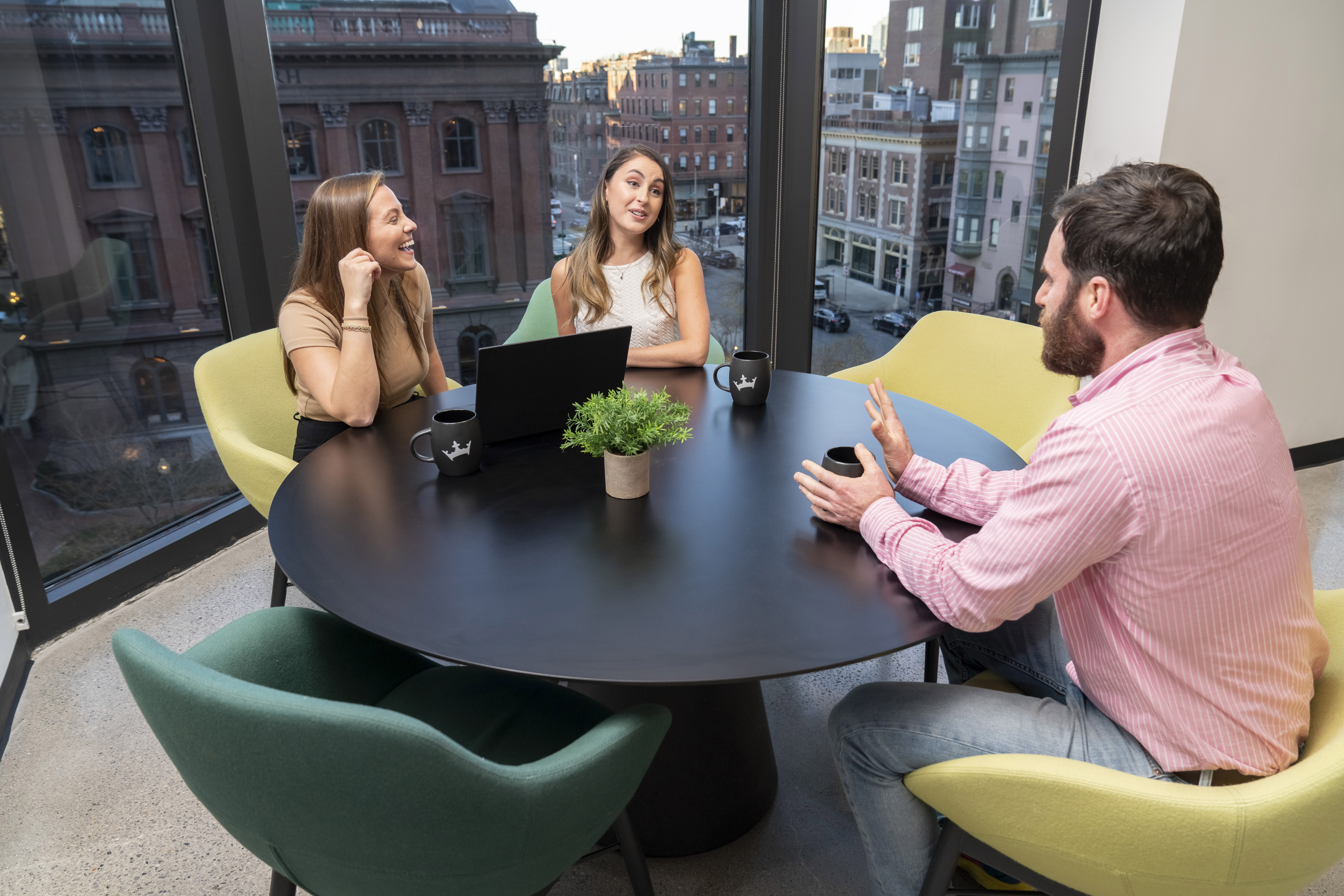 a group of people sitting at a table