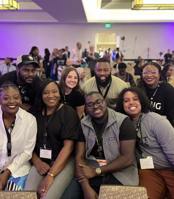 a group of people posing for a photo