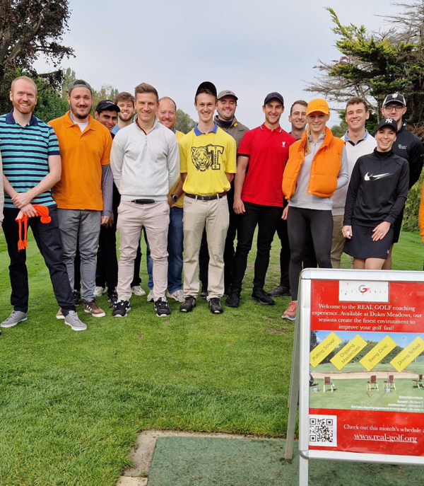 a group of people posing for a photo