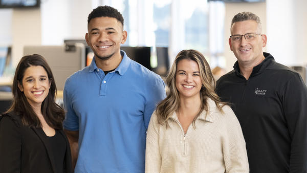 a group of people posing for a photo