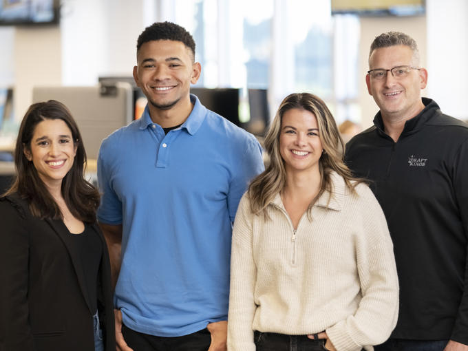 a group of people posing for a photo