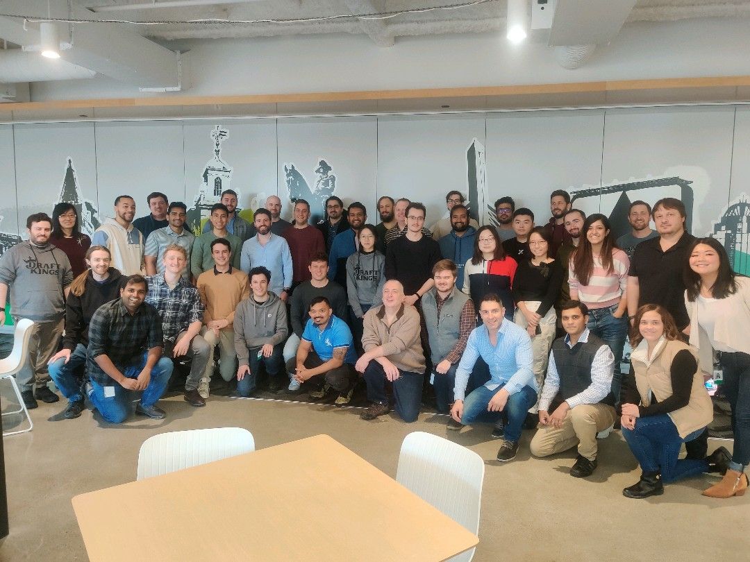 a group of people posing for a photo