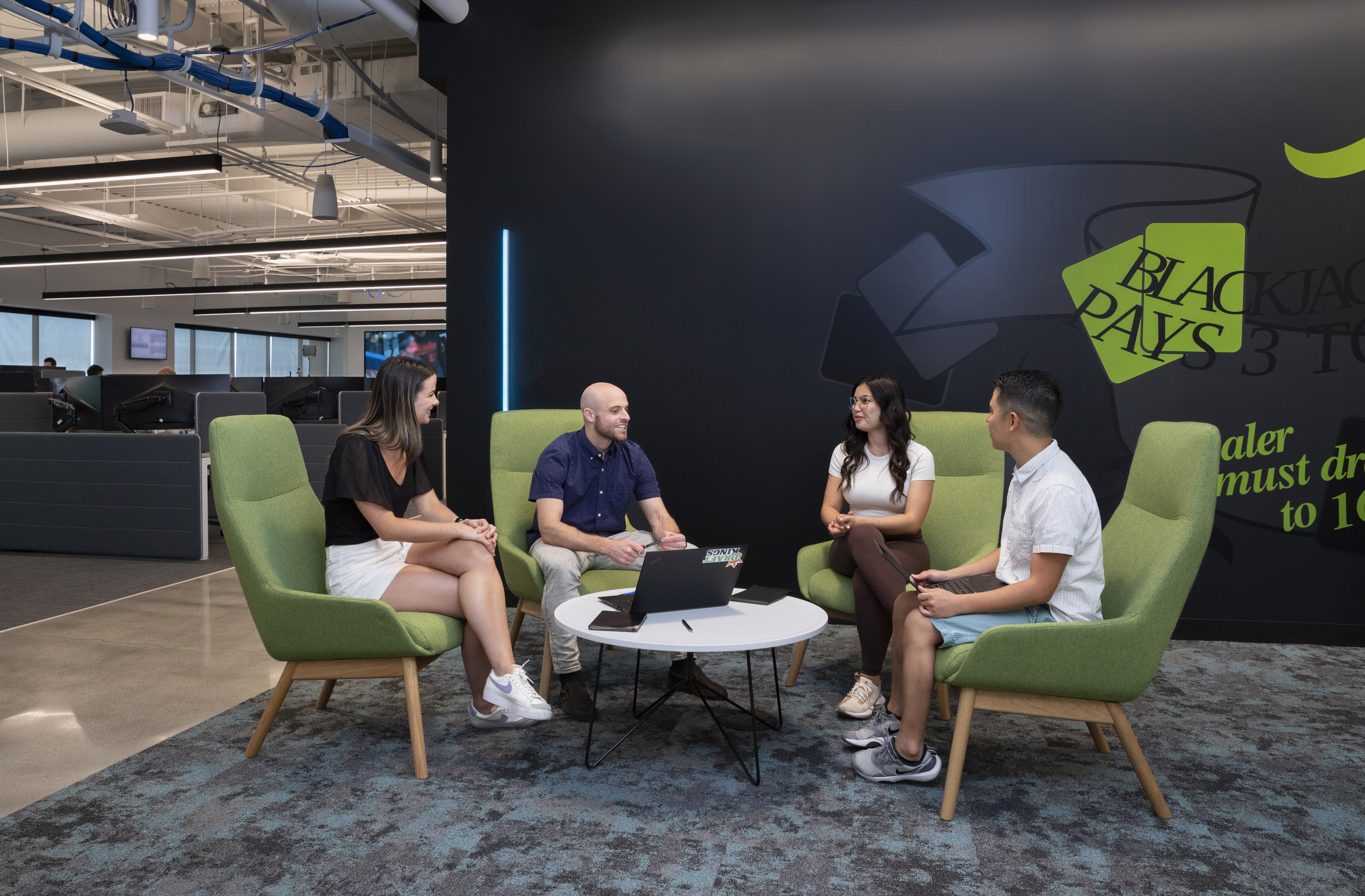 a group of people sitting in chairs