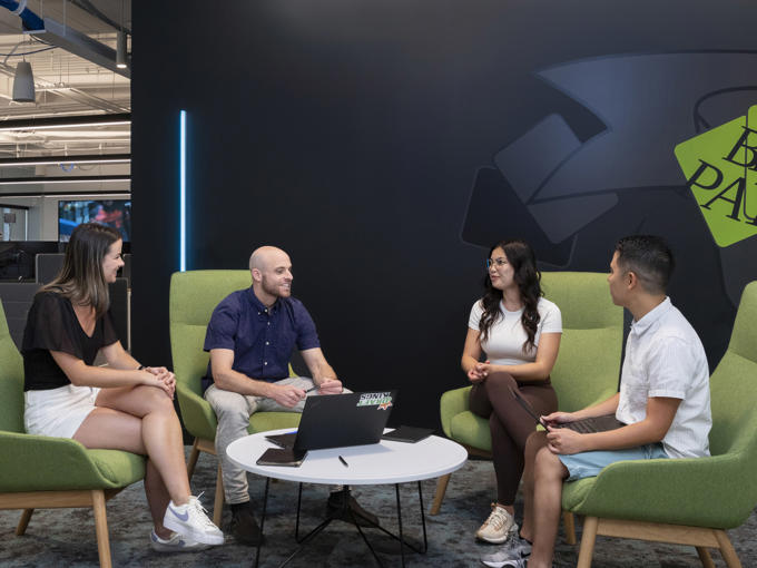 a group of people sitting in chairs