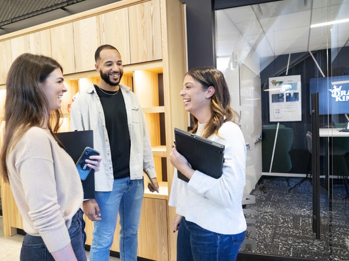 a group of people standing in a room